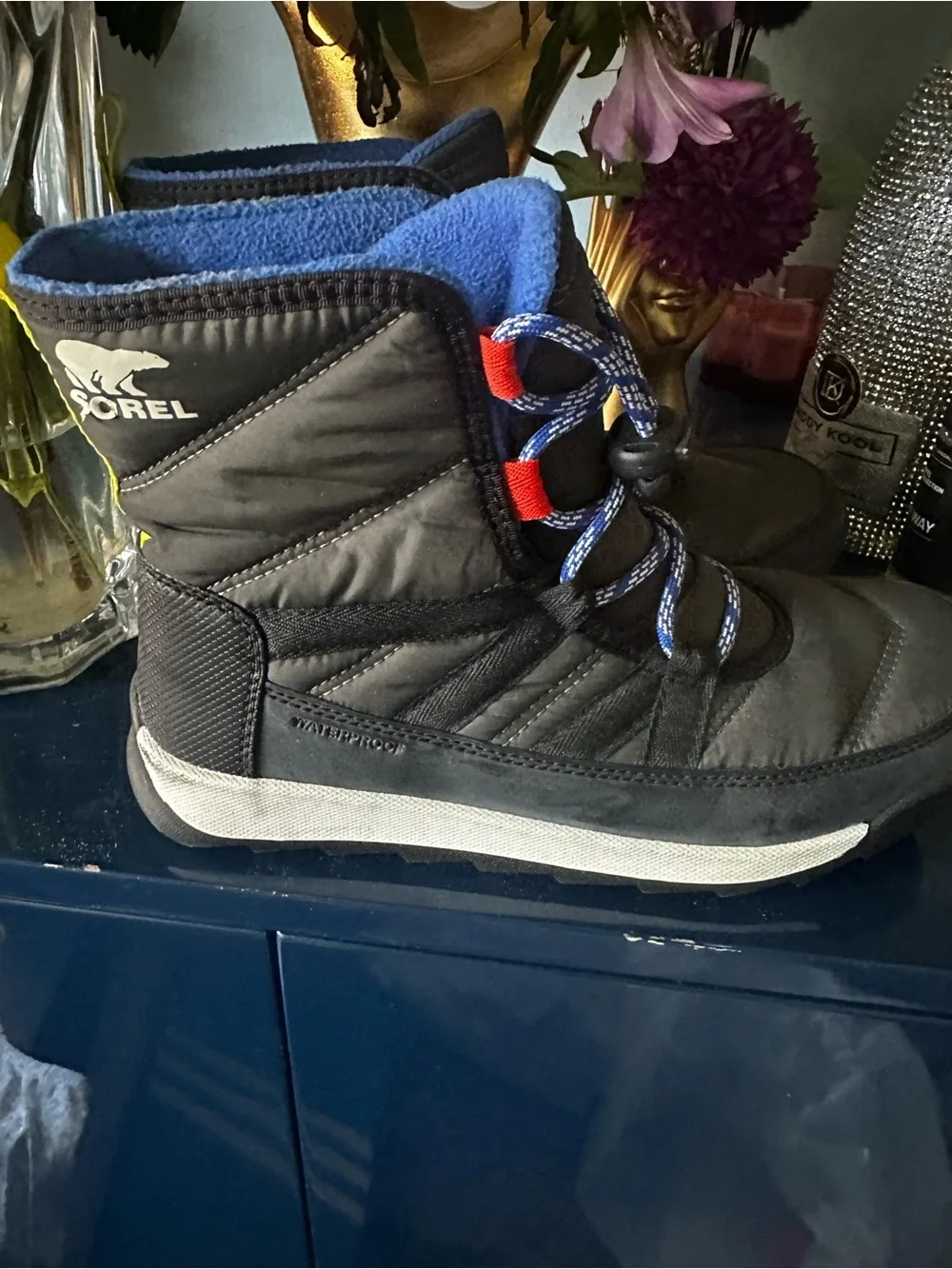 Sorel Kids Black Winter Boots with Blue Laces and Red Accents